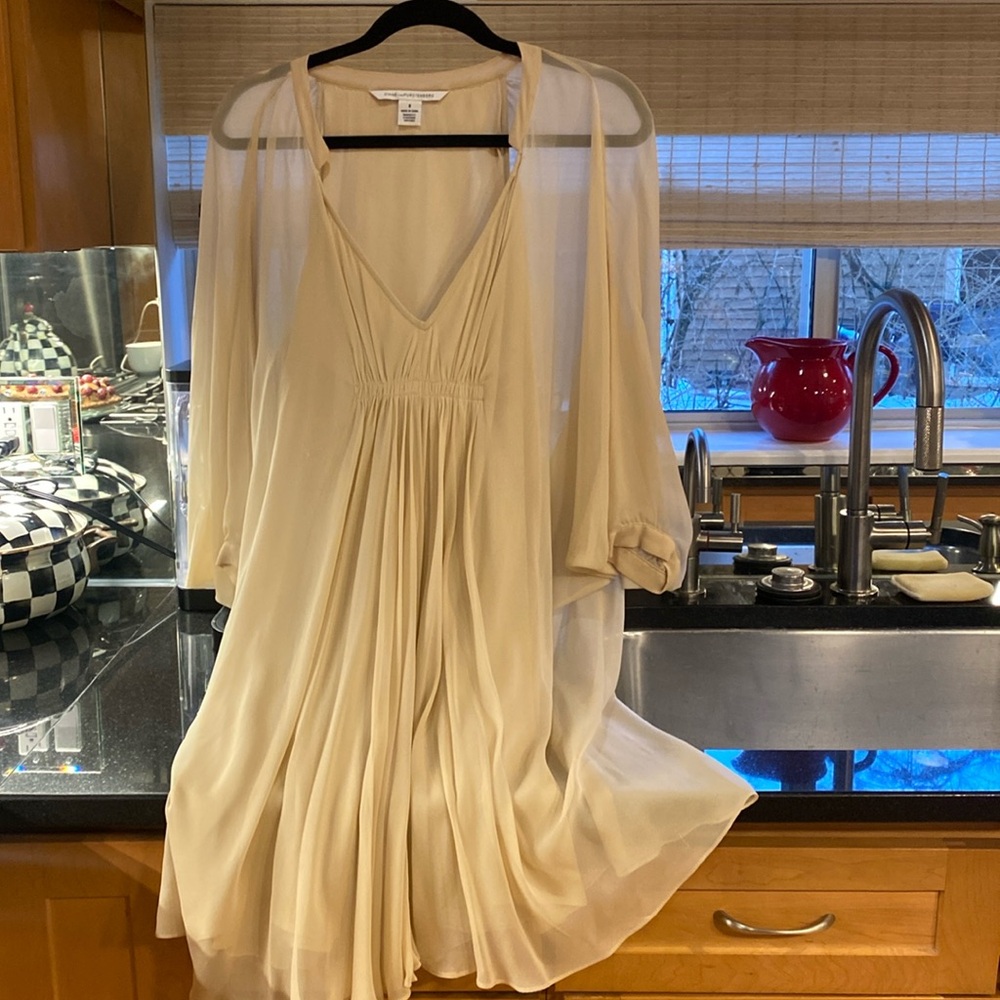 Diane Von Furstenberg cocktail dress with fitted slip attached. Like new.